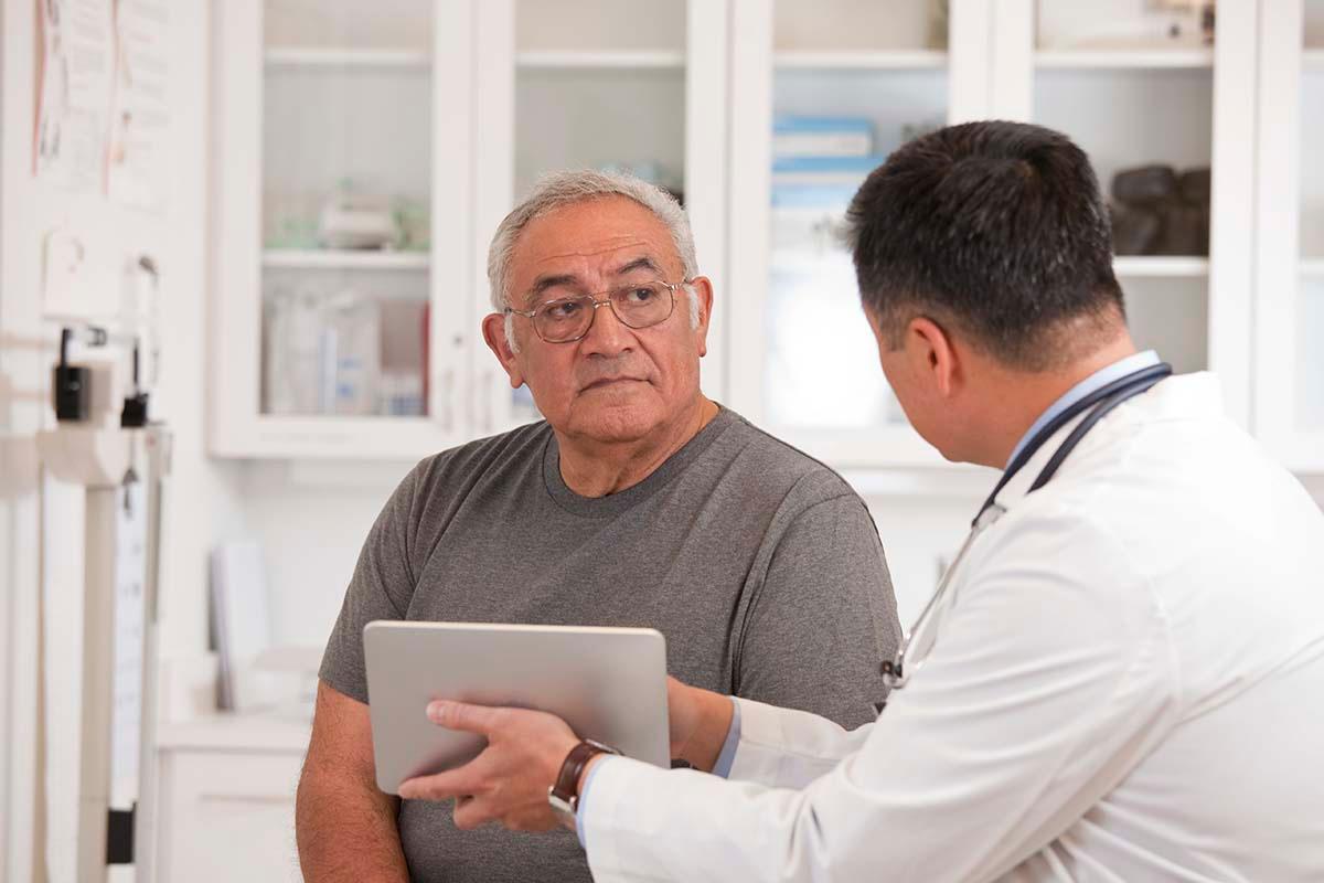 doctor talking with patient