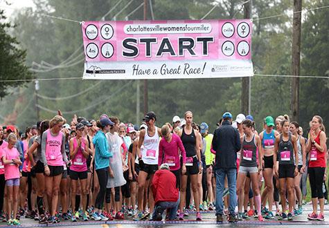 Runner participate in the 35th annual Charlottesville Women's Four Miler race in Charlottesville, VA. The event is a fundraiser for the University of Virginia Cancer Center’s Breast Care Center.