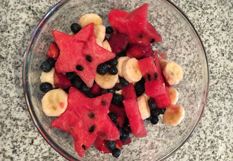 Star-Spangled Fruit Salad with blue berries, bananas, and star watermelon