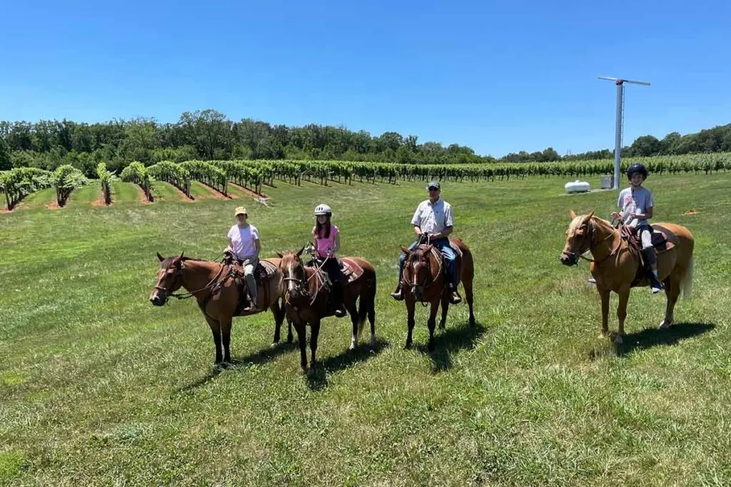 Norm and his family recently riding horses.