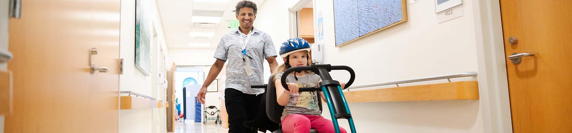Physical therapist and little girl in a session