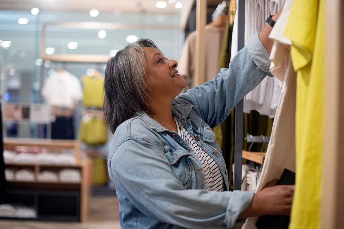 A woman shopping for ostomy clothing