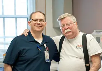 Lung transplant and COPD: recipient Pat Gutekenst with UVA Transplant Center nurse practitioner Shawn Floyd