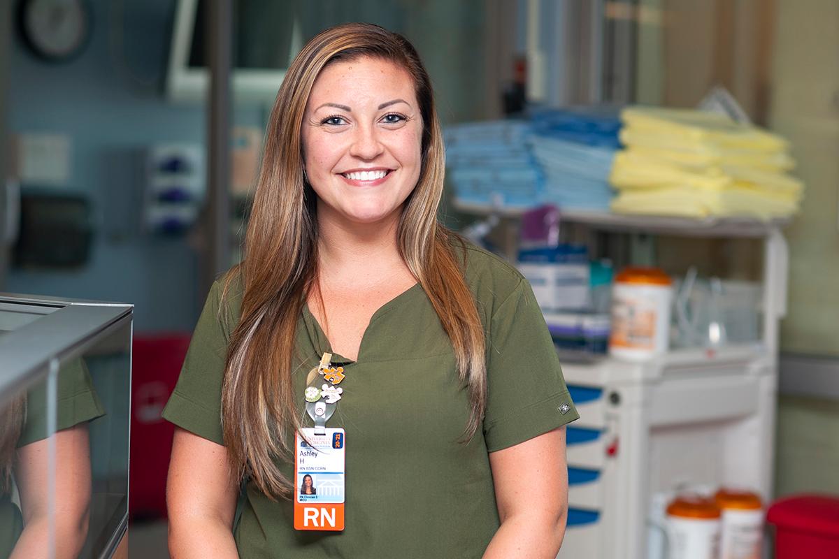Ashley Harlow, RN, cared for critically ill patients with COVID for the first  10 months of the pandemic. She hasn't gone back to working on the COVID unit since December, when she lost her grandmother to COVID. Photo by Kay Taylor.