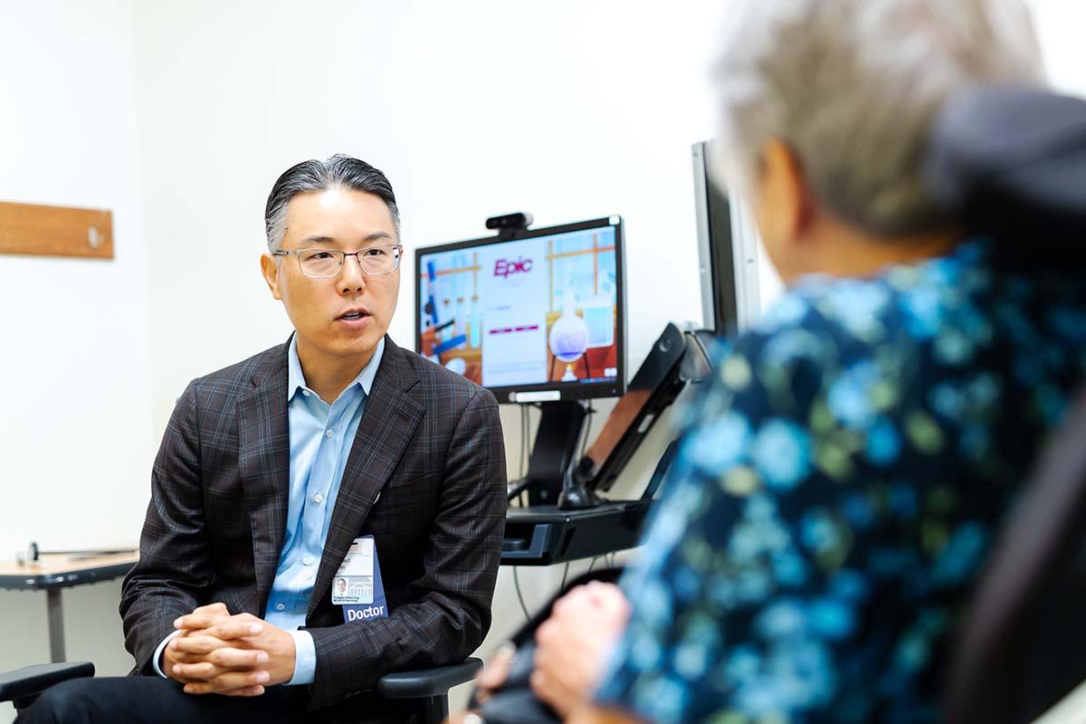 Robert Shin, MD, director of UVA Health’s MS and Clinical Neuroimmunology Division, helps patients with MS understand their treatment options.