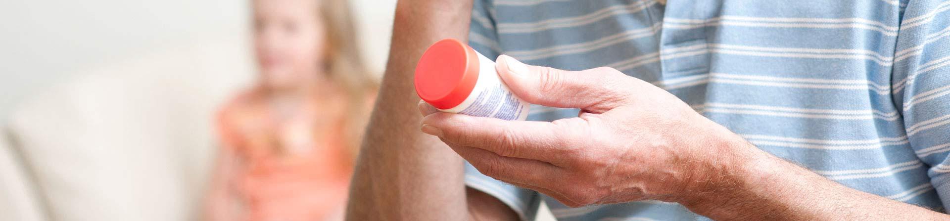 person examining medicine