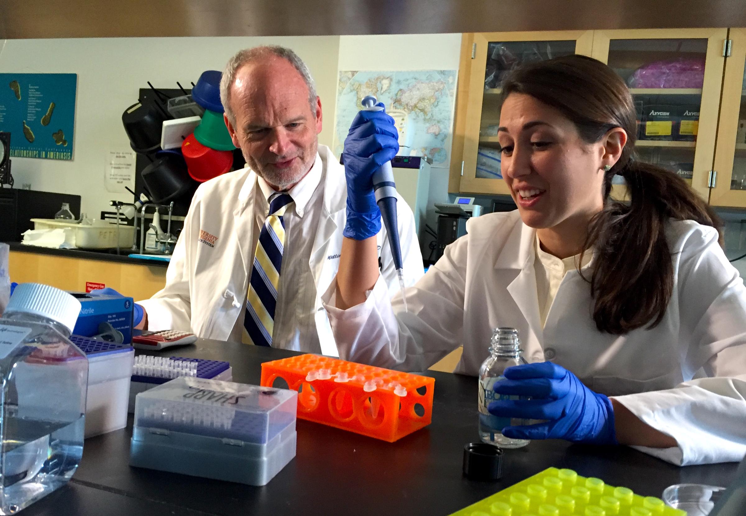 Bill Petri, MD, PhD, and Erica L. Buonomo, PhD, collabrate at the UVA School of Medicine.