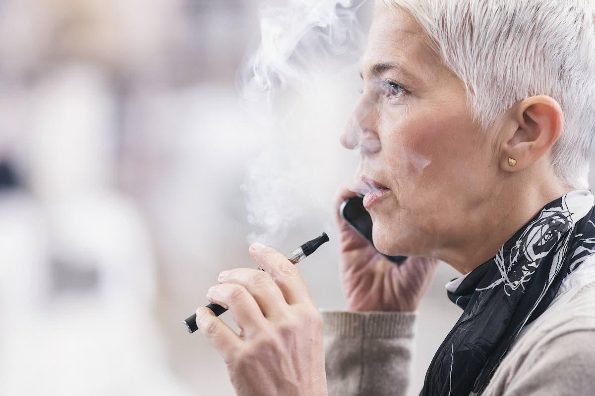 woman vaping outside