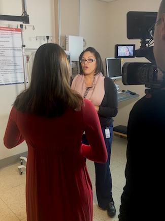 Nurse practitioner Elizabeth Conde Alvarez is interviewed by Victoria Wreslio of NBC 29.