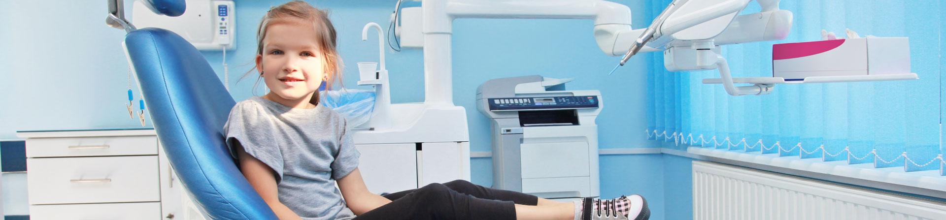 young girl in dentist's office