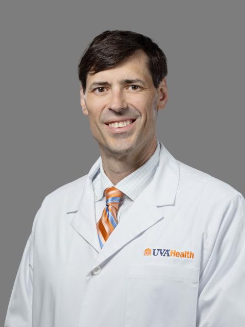 John T Saxon, MD