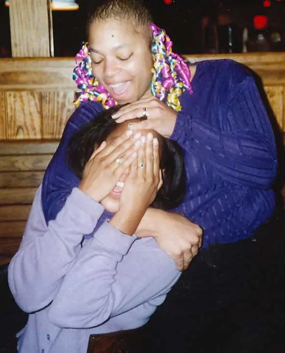 Sheila with her twin sister, Lisa, who died of breast cancer at age 35.
