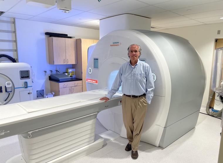 UVA Health radiologist James R. Stone, MD, PhD, will use this advanced MRI machine in a bid to detect now-undetectable brain scarring in military personnel.