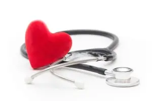 Image of stethoscope. Checkups with your doctor and lifestyle changes play a key role in heart attack prevention.