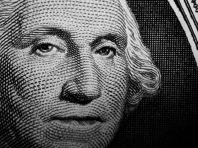 Closeup of George Washington's portrait on the U.S. dollar.