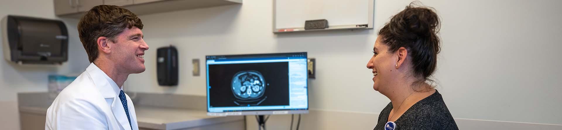 a doctor talks with a patient