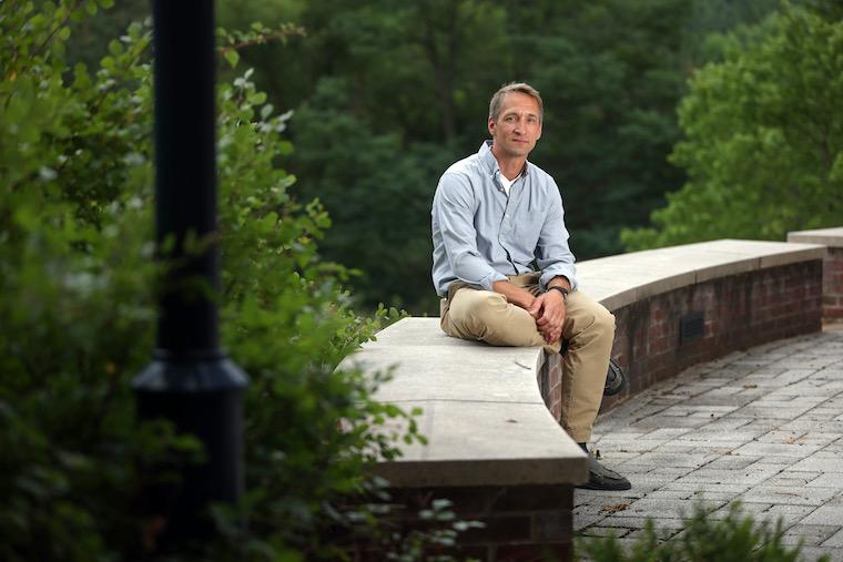 Scientist Jochen Zimmer, PhD, outside his lab at the UVA School of Medicine. (Photo by Andrew Shurtleff/AP Images for Howard Hughes Medical Institute.)
