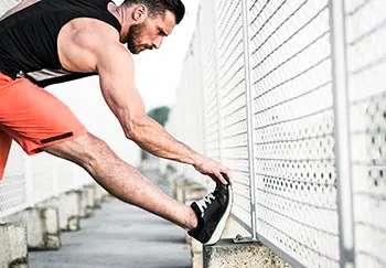 prevent a ruptured achilles tendon by stretching before exercising