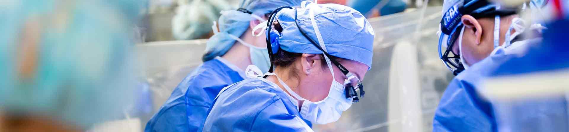 A vascular surgeon working on a patient