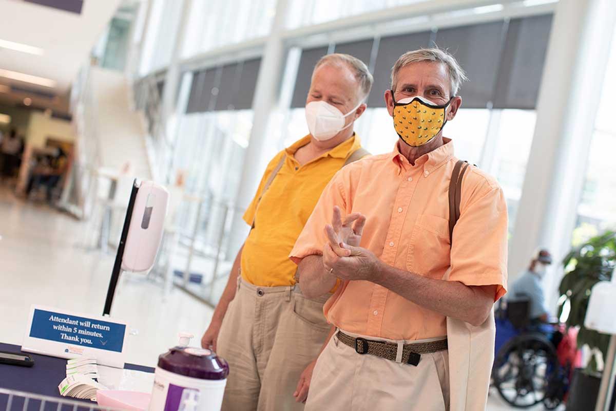 Bruce, on right, and Peter during a Charlottesville visit to see Bruce's lymphoma care team at UVA. With lymphoma and COVID-19 in retreat, Bruce is back to enjoying traveling and even helping with the planning of his 45th UVA class reunion in 2022.
Photo by Coe Sweet  