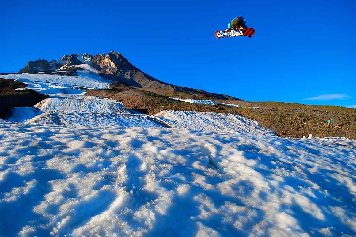 Ted Bendixson getting air while snowboarding. He's back to his active lifestyle after an urgent mitral valve repair.