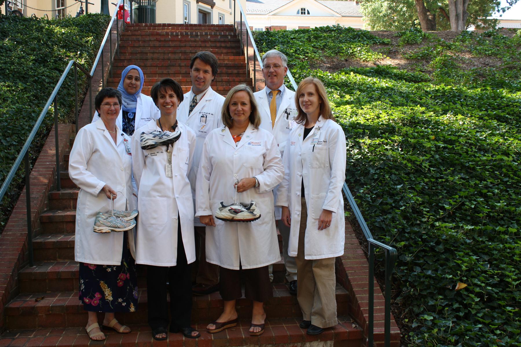 Dr. Karen Johnston (lower row, second from left) will be defending her title at the Walking for My Life walk-run event on Saturday, September 18. Joining her will be other members of UVA's Primary Stroke Center.