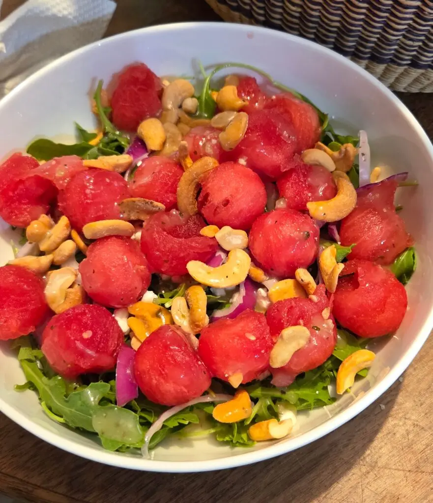 Watermelon salad with cashews: a protein-packed, refreshing summer option that the whole family can enjoy.