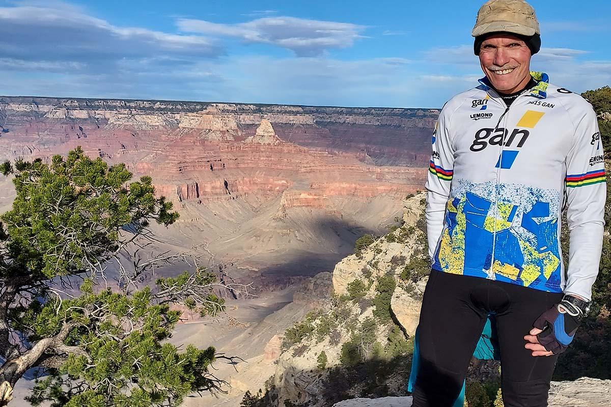 Bob Wright poses next to the Grand Canyon. This was one of his stops along his cross-country bicycle tour after an ablation for afib at UVA Health.