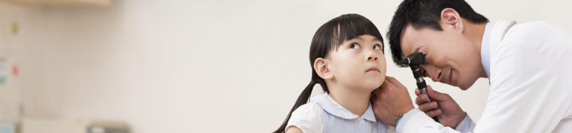 young girl getting an ear exam