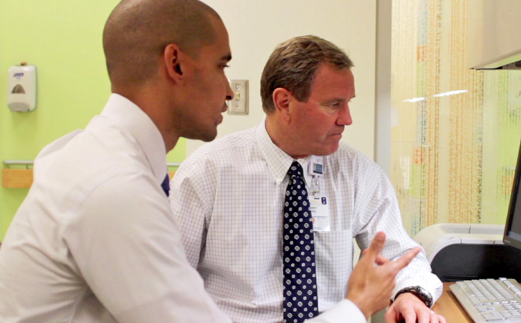 Genetic counselor Matt Thomas and cardiologist Robert Battle, MD