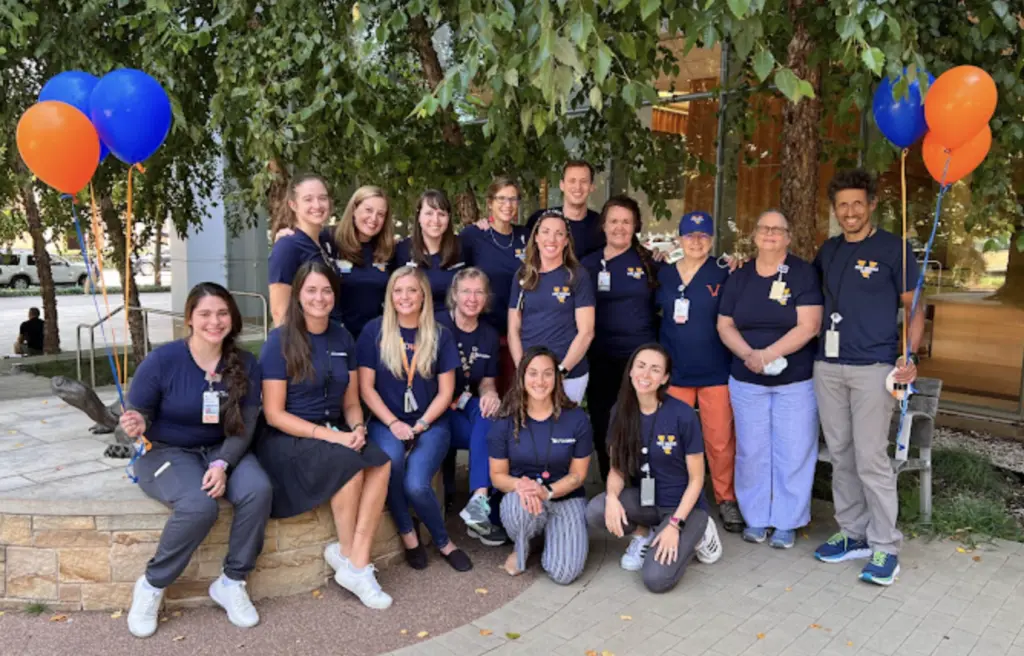 The UVA Children's pediatric neuromuscular team in front of the Battle Building in July 2022.
