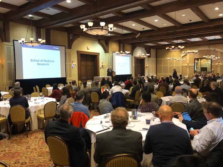 Craig Kent, MD, UVA's new vice president for health affairs, welcomes attendees to the School of Medicine's research retreat.