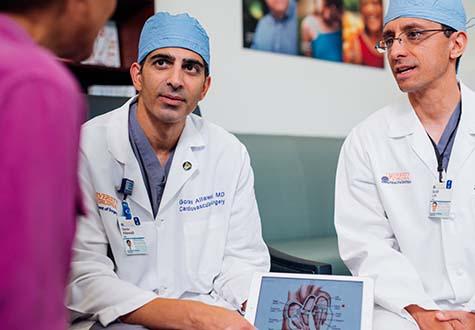 doctors discussing heart surgery with patient