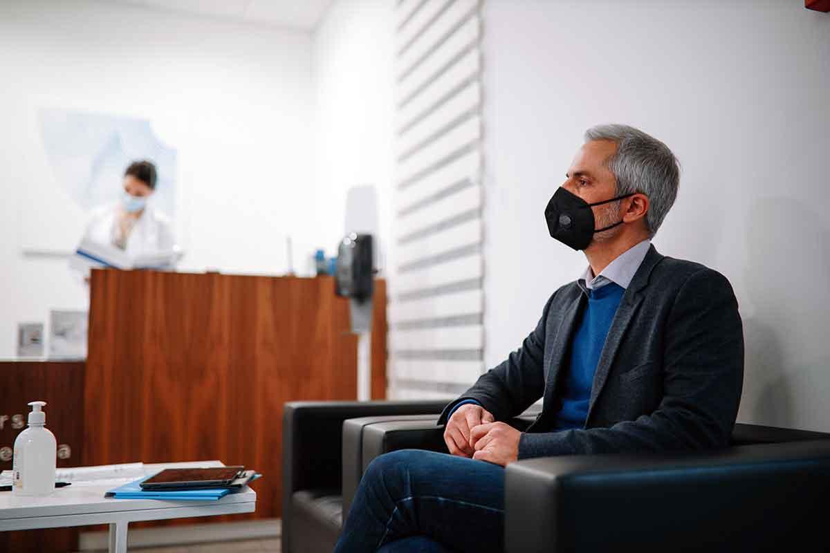 man waits for his mammogram