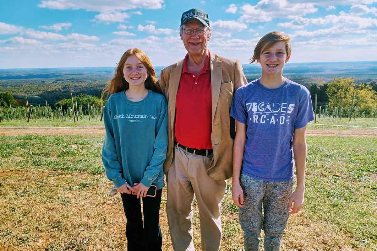 Norm and his beloved grandkids.