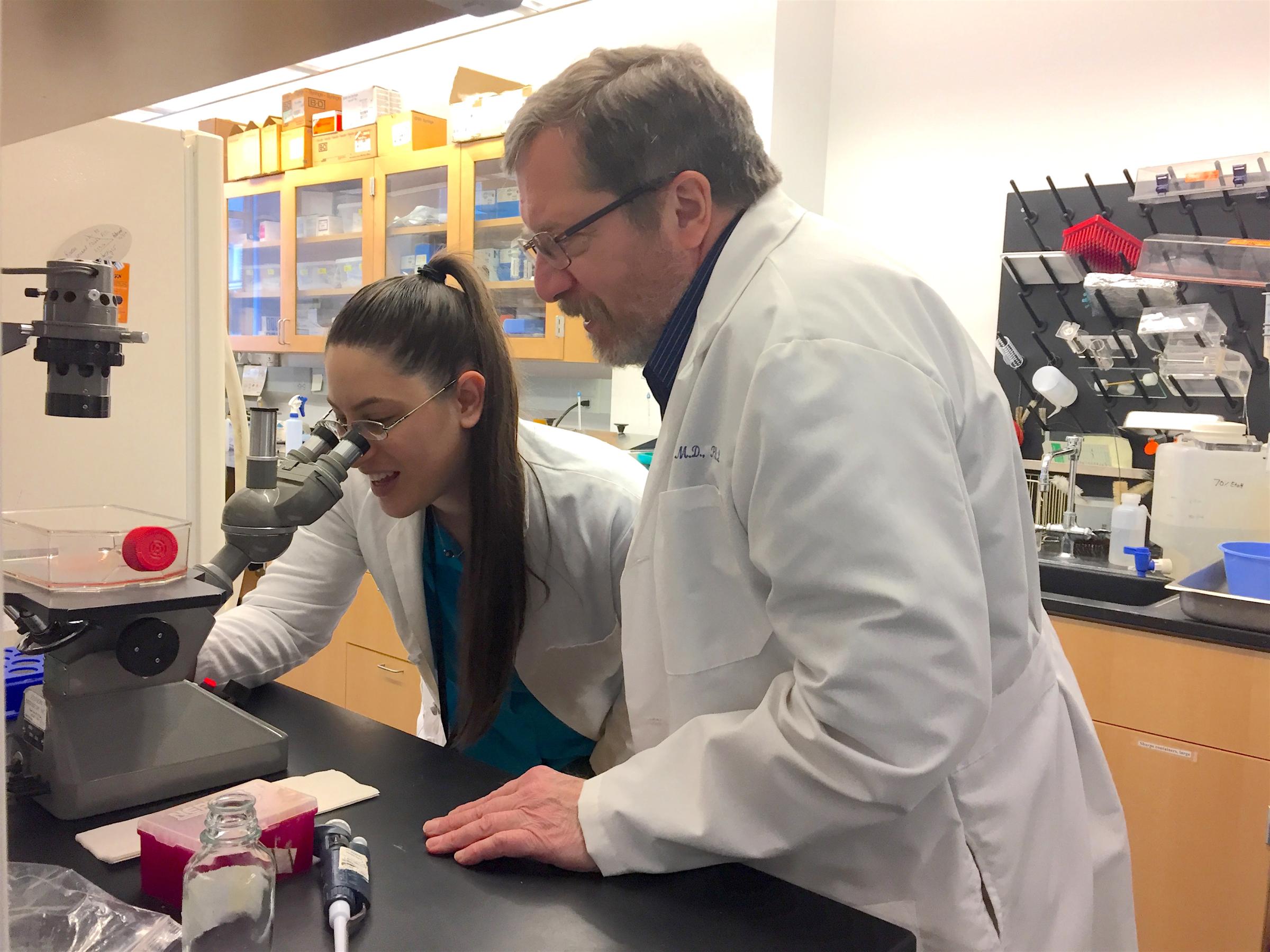 Researchers Amber Cardani, PhD, and Thomas J. Braciale, MD, PhD