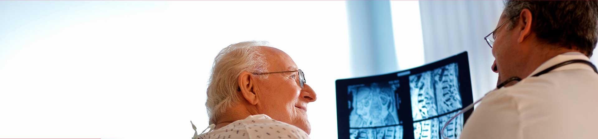 doctor reading xrays to patient
