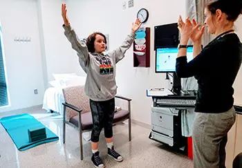 Way shows Josephine how to breathe to ease anxiety.