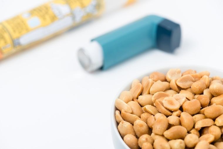 Peanuts displayed next to inhaler