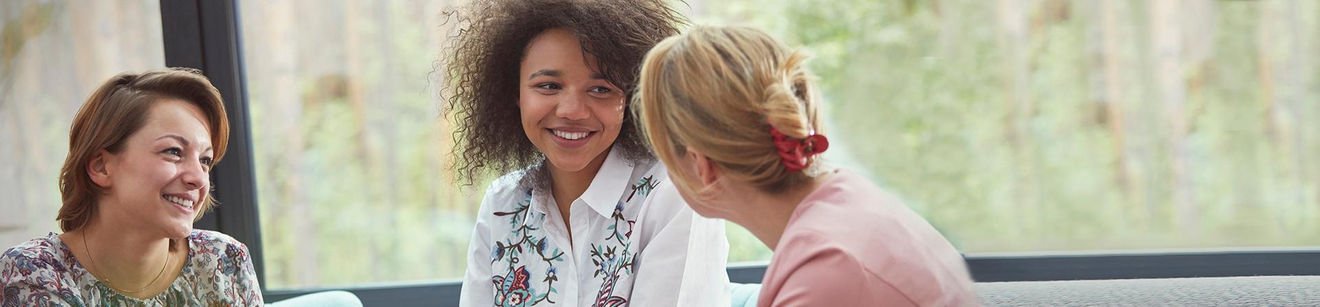 Trauma survivors meet at a support group.
