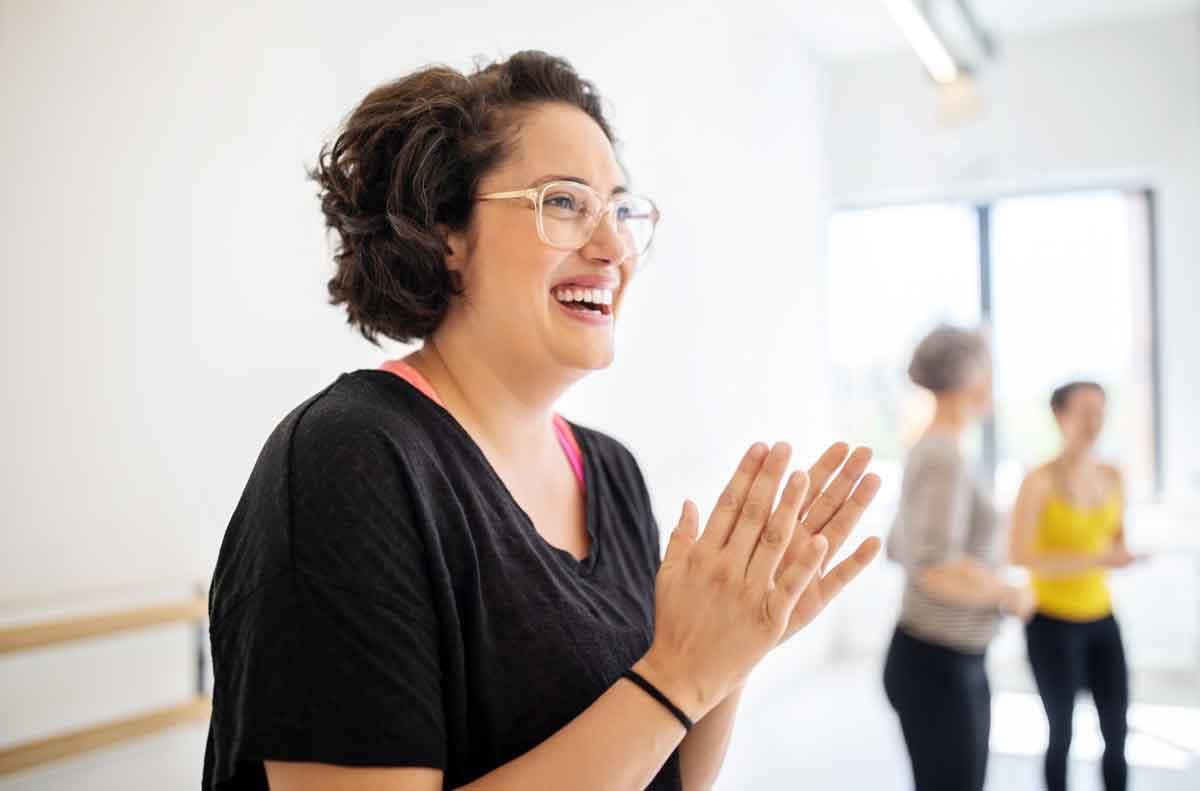 woman exercising with others