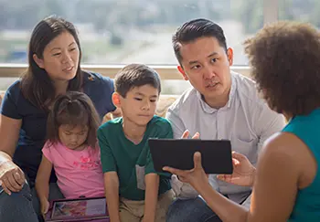 genetic counselor reviews information with family prior to clinical genetic testing