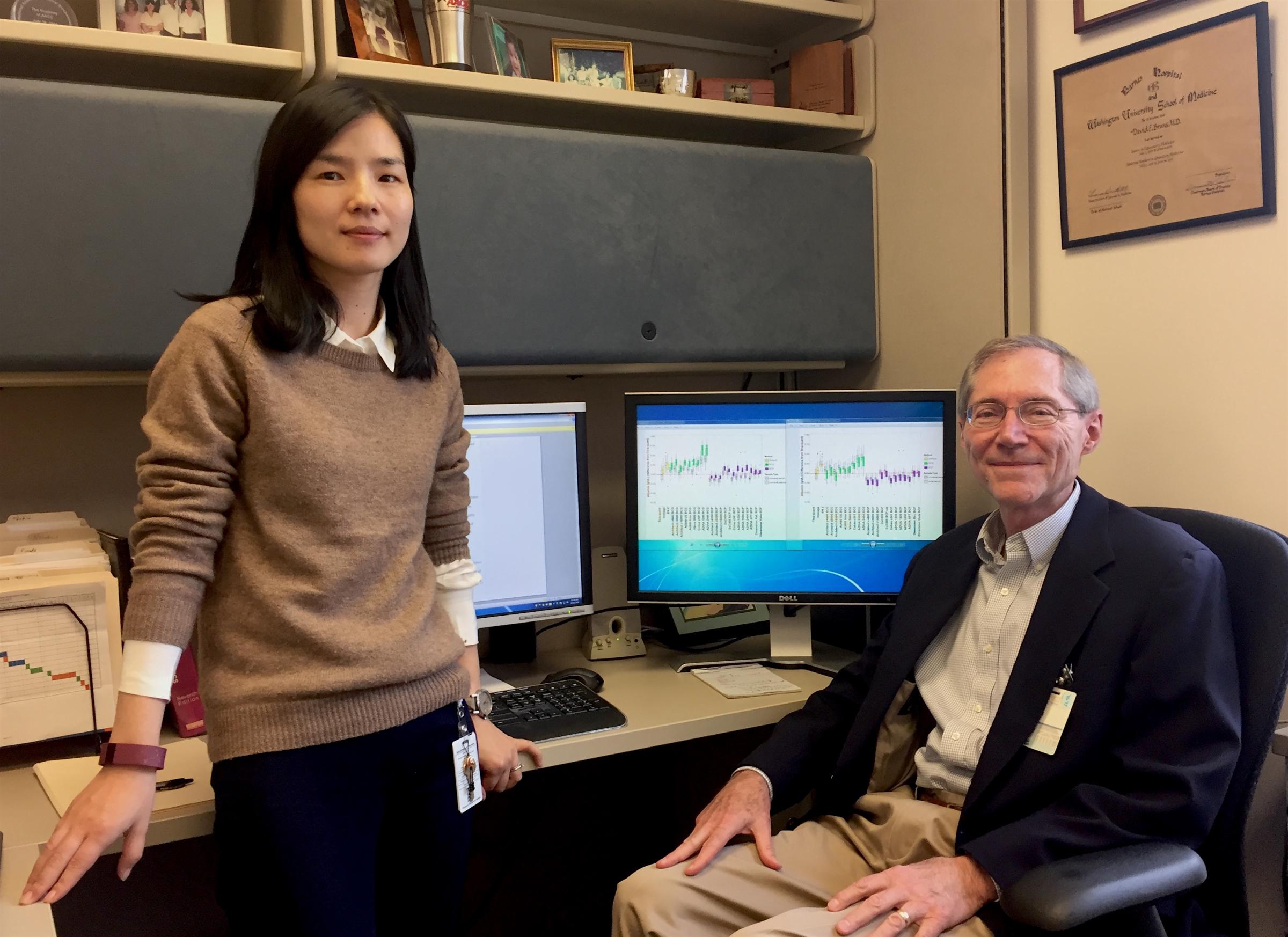 Min Yu, MD, PhD, and David Bruns, MD, display their troubling analysis of dialysis blood testing methods.
