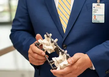 New PEEK/CF implant device